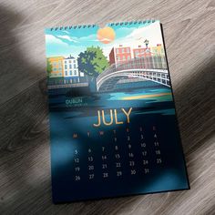 a calendar sitting on top of a wooden table