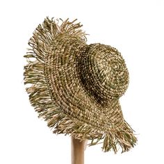 You may wear it, or you may use it as a beautiful wall decor! This lovely summer hat is perfect for any occasion. With shades of army green, it's a great addition to your wardrobe. It's made from raffia in various natural tones, making it lightweight and easy to wear. Put on your summer sandals and let the fun begin!Let's have some fun with this beautiful and unique piece, handcrafted from sustainable materials.‎ Each piece celebrates the natural characteristics inherent in the materials. Fashio Jungle Green, Water Hyacinth, Let The Fun Begin, Banana Leaf, Natural Tones, Beautiful Wall, Summer Hats, Sandals Summer, Have Some Fun