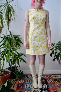 "Yellow and White Sixties/Seventies Mini Mod Dress by \"Lanz Originals\". Hook and Eye Wrap Back Closure. Asymmetrical Bow Detail. Empire Waist. Lined Bodice. Skirt Unlined. No Content Label Excellent Vintage Condition - minor armpit discolouration Fits Size Small/Extra Small Chest - 34\" Waist - 29\" Hip - 38\" Length - 32\" All Sales Are Final. We have taken the time to note all size measurements and the condition of each piece so please look over all the information of the garment you are con Spring Fitted Mod Mini Dress, Fitted Mod Mini Dress For Spring, Mod Mini Dress For Spring, Lined Mod Summer Dresses, Vintage Sheath Dress For Summer, Fitted Mod Floral Print Dresses, Fitted Mod Dress With Floral Print, Spring Mod Fitted Dress, Retro Mini Dress For Spring Daywear