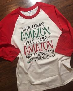 Here Comes Amazon Christmas shirt | Funny Christmas shirt, Amazon lover gift, Funny Christmas Shirt Ideas Vinyl, Christmas Shirt Ideas Funny, Xmas Packaging, Christmas Doors, Christmas Cricut, Quote Svg Files, Cricket Ideas, Cricut Shirts, Christmas Shirt Funny