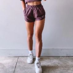 Never Worn Gymshark Shorts. Xs. Color Is Purple. The Exact Color Is The One I’m Holding In My Hand. (Other Pic Isn’t As Good Lighting) High Waisted. Gymshark Shorts, Good Lighting, Cool Lighting, Purple Color, Color Purple, The One, High Waist, High Waisted, Womens Shorts