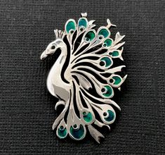 "Peacock Brooch Intricate and stunning design solid sterling silver with enamel feather \"eyes\" Can be made with other colours on request   Stainless steel sprung pin 43 x 30 mm  medium sized" Formal Silver Enamel Brooches, Silver Enamel Brooch Pin, Silver Enamel Pin For Wedding, Silver Enamel Wedding Pin, Peacock Jewellery, Purple Jewelry Set, Purple Jewellery, Pink Jewellery, Peacock Brooch