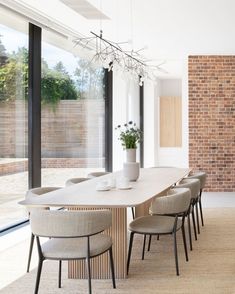 a dining room table with chairs around it