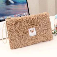 Khaki Large Capacity Plush Travel Trendy Rectangular Pencil Case For Everyday, Trendy Rectangular Portable Pouch, Beige Zipper Pouch Pencil Case For Daily Use, Beige Zipper Pencil Case For Daily Use, Beige Portable Cosmetic Bag For School, Portable Beige Cosmetic Bag For School, Portable Beige Pencil Case For Daily Use, Trendy Portable Rectangular Pouch, Trendy Rectangular Cosmetic Bag