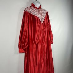 Brand: Anne LeslieSize: M nightgown from the 1980's - can also be used as a robe.Made in the USARed satin High, ruffled neckWhite lace yoke1/2 zip closureMeasurements:Bust: 23. 5"Shoulder to shoulder: 16. 5"Back collar to hem: 55"No defects noted. Red Satin Nightgown For Wedding Night, Vintage Satin Wedding Sleepwear, Vintage Satin Sleepwear For Wedding, Vintage Satin Sleepwear, Vintage Satin Nightgown For Sleep, Vintage Nightgown, Red Satin, Vintage Boutique, Night Gown