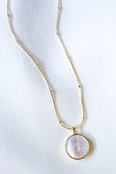 Measurements: 19.5" Chain w/ Approximately .9" Pendant Materials: Gold Filled, Shell Pearl The Chain, Pearl Pendant, The Eye, Mother Of Pearl, Gold Filled, Pearl Necklace, Shells, Sleek, Beads