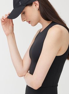 An athletic-style fitted tank with a high crew neckline and flat seams for added comfort. This ultra-soft and four-way flexible cropped tank is made from quick-dry, UPF 40+ fabric, so you can move effortlessly from sunrise to sunset. Compressive Tank Top For Light Sports, Functional Tank Sports Bra For Summer, Black Summer Tank Top For Pilates, Black Tank Top For Summer Pilates, Versatile Racerback Sports Bra For Summer, Versatile Sports Bra With Mesh Back, Summer 4-way Stretch Racerback Sports Bra, Versatile Summer Racerback Sports Bra, Compressive Racerback Sports Bra For Summer