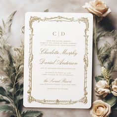 wedding stationery with flowers and greenery laid out on a tablecloth for the ceremony