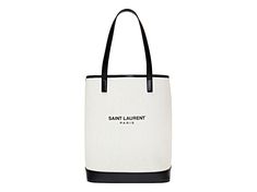 This "Teddy" bucket bag is is crafted of an off-white coated linen with a black printed Saint Laurent logo. The open top bucket bag includes a detachable black leather drawstring insert with a suede pouch. This is a perfect tote for on the go and everyday use, with the distinctive style from Saint Laurent!          Model number: 551595  Coated linen  Smooth black leather details  Printed Saint Laurent Paris logo  Removeable black leather drawstring insert with suede interior and suede pouch  Dou Off White Coat, Saint Laurent Logo, Michael Kors Fashion, Paris Logo, School Jewelry, Drawstring Bucket Bag, Beading Tools, Saint Laurent Paris, Popular Jewelry