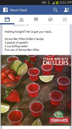 a facebook page with strawberries and limes on the table next to cups filled with juice