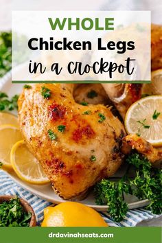 whole chicken legs in a crockpot on a plate with lemons and parsley