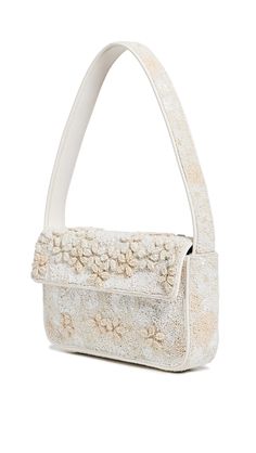 PRICES MAY VARY. Leather trim, Structured silhouette, Slip back pocket, zip interior pocket, Pearlescent floral design Length: 10.25in / 26cm, Height: 6in / 15cm, Handle drop: 7.75in / 20cm, Depth: 2in / 5cm Satin lining Weight: 27oz / 0.77kg Tommy Bag Staud Beaded Bag, Staud Bags, Staud Tommy Bag, Natural Wardrobe, Tommy Beaded Bag, Statement Sandals, Dream Bags, Bachelorette Outfits, Best Handbags