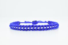 Fashionable and durable hand-made blue bracelet with a white line, adjustable to fit wrist sizes from 6 to 9 inches, Made from high quality string, it will be sure to last. Each bracelet is carefully handcrafted and give proper time to ensure quality. Fast & Free shipping White Braided Beaded Bracelets As Gift, White Braided Jewelry Gift, White Braided Jewelry As A Gift, Casual White Adjustable Braided Bracelets, White Braided Casual Jewelry, Casual Adjustable White Braided Bracelet, Casual White Braided Jewelry, Blue Braided Bracelets With Adjustable Cord As Gift, Blue Braided Bracelet With Adjustable Cord As Gift