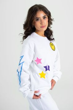 White crewneck with multi pattern design including stars, lightning bolt, and smiley face matching sweatpants and set are available (for customizable requests please email us or dm us on instagram) Casual Star Print Sweatshirt For Loungewear, Casual White Sweats With Graphic Print, Casual White Graphic Print Sweats, White Casual Sweats With Graphic Print, Trendy Crew Sweats For Loungewear, Playful White Sweatshirt For Loungewear, White Graphic Print Sweats Relaxed Fit, White Relaxed Fit Sweats With Graphic Print, White Graphic Print Sweats With Relaxed Fit