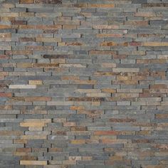 a brick wall that is made out of different colored bricks