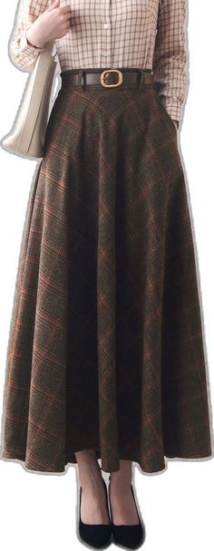 Brown Pleated Skirt For Winter Workwear, Wool Maxi Skirt For Fall Workwear, Knee-length Maxi Skirt For Workwear In Fall, Classic Brown Wool Skirt, A-line Wool Skirt For Work, Wool A-line Skirt For Work, Elegant Wool Maxi Skirt With Lined Skirt, Classic A-line Pleated Skirt For Fall, Wool Flared Maxi Skirt For Work