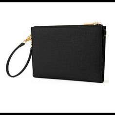 New Dagne Dover Essential Clutch Wallet In Onyx With Gold Hardware. 9 1/2"W X 6 1/2"H X 1"D. A Slender Clutch In Wipe-Clean Canvas Also Works As A Sleek Wallet And Features Removable Wrist And Crossbody Straps For Hands-Free Carry. Zip Pockets Sized For Your Smartphone And Passport Further Maximize Convenience, While Interior Space For Your Cards And Other Night-Out Necessities Make It An Essential Take-Along. Snap Closure Removable Wrist Strap; Removable, Adjustable Crossbody Strap Two Exterior Zip Pockets Interior Currency And Wall Pockets; Eight Card Slots; Lipgloss Holder; Key Clip Pvc Imported Dagne Dover, Key Clip, Black Travel, Wall Pockets, Wrist Strap, Clutch Wallet, Gold Hardware, Cleaning Wipes, Zip Pockets