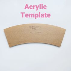 a piece of cardboard with the words acrylic template on it and pink lettering