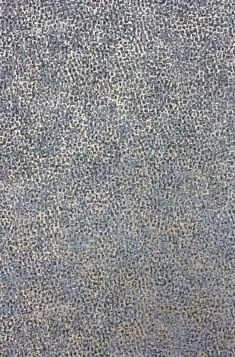 the texture of an old carpet is blue and gray with white dots on it, as well as some black spots