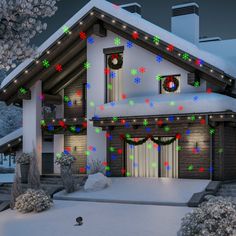 a house is decorated with christmas lights and wreaths