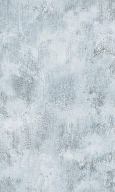 an old, grungy wallpaper with white paint on the top and bottom