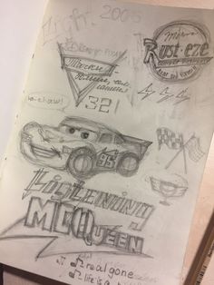 a drawing of cars and logos on paper