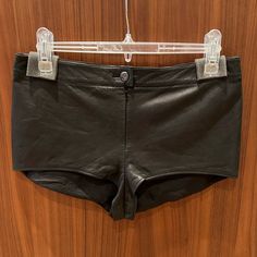 Chanel Mini Leather Shorts (Runway Collection) Chanel Black Soft Lambskin Leather Shorts Silk Lined. Color: Black Size: Fr 36 (Xs) French Sizing 36. Outer - 100% Lambskin Lining - 100% Silk Hardware - Silver Button Very Good Condition ***Do Not Bundle Listings Priced At $500 And Over - Sale Will Be Cancelled*** Fitted Leather Shorts, Fitted Short Leather Bottoms, Fitted Short Leather Pants, Designer Fitted Black Leather Pants, Luxury Bottoms For Night Out, Luxury Black Short Bottoms, Fitted Black Leather Shorts, Luxury Fitted Short Bottoms, Designer Black Leather Bottoms