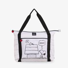 a white bag with a snoopy cartoon on the front and black trimmings