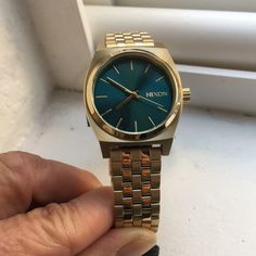 Nixon Happy Medium Time Teller. Stainless Steel. Japan Movement. Gold Metal With Teal Blue Face. Gold Hands. Nixon Watch Men, Nixon Time Teller, Nixon Watch, Chrono Watches, Pink Watch, Blue Face, Gold Wedding Jewelry, Gold Aesthetic, Stacked Jewelry