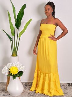 You'll be walking on sunshine all summer long in this darling mustard yellpw pleated smocked maxi dress! We're loving the maxi length (fully lined by the way), elasticated tube top shirring and flattering multi-strap back. You'll kill this with a pair of nude sandals and your fave hand bag CONTENT & CARE Hand wash with cold water Polyester DEETS & FIT Model is wearing a size Medium Fabric has some stretch in the top smocked area Model profile: Uche is 5'9" and measures 34 (bust) 27 (waist) and 4 Solid Summer Maxi Dress With Ruched Bodice, Spaghetti Strap Maxi Sundress With Smocked Bodice, Spaghetti Strap Smocked Bodice Sundress, Solid Color Ruched Maxi Dress With Spaghetti Straps, Casual Ruched Maxi Dress For Beach, Solid Ruched Maxi Dress With Spaghetti Straps, Sundress Maxi Dress With Ruched Bodice For Brunch, Casual Ruched Maxi Dress For The Beach, Casual Maxi Dress With Ruched Bodice And Spaghetti Straps