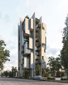 a tall building with plants growing on it