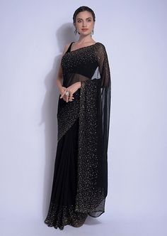 Black Georgette Sequins n Pearl embellishment length--5.5 mts NOTE: Visual Samples on website may differ slightly from actual product due to light & effects during photography (Length & Breadth have 1 n 1.5 inches +/-). NOTE : Before placing order ,pls confirm product n color availability on +91 7903893945 & +91 8447750028(WhatsApp) NOTE : For Wholesale Order MOQ is 5 Pieces of any color/Pattern contact on +91 7903893945 & +91 8447750028(WhatsApp) Black Embellished Saree For Party Wear, Formal Black Saree With Mirror Work, Elegant Embellished Saree, Elegant Black Saree With Mirror Work, Black Embellished Fitted Saree, Elegant Embellished Saree For Evening, Fitted Black Embellished Saree, Elegant Embellished Evening Saree, Glamorous Embellished Saree For Evening