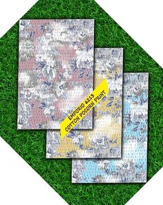 three different patterns on the grass with a yellow sticker that says,'fabric for quilt