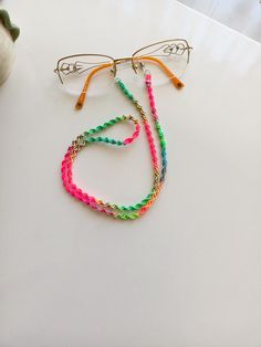 Macrame glasses chain, spectacle strap, sunglasses strap, glasses holder, spectacle chain, glasses lanyard, eyeglass necklace. Colorful eyeglass string that I knitted with macrame technique.  sent in a gift box. Size: 70 cm Glasses Lanyard, Eyeglass Necklace, Glasses Chains, Sunglasses Strap, Necklace Colorful, Glasses Holder, Glasses Chain, Eye Wear Glasses, Spectacles