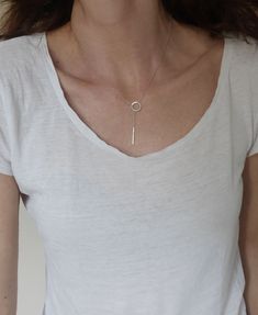 This Lariat necklace is totally handmade made from sterling silver. A dainty necklace that adjusts to any outfit. Great layering charm necklace, easy to wear on its own too. The diameter of the circle is 12 mm and the bar is 20 mm long. Length: 52 cm -----> 20 inches 62 cm -----> 24 inches 72 cm -----> 28 inches Feel free to ask for a different length. The necklace above is not the exact one you will receive. Each one is handmade to order and may slightly vary from the pictures. Please Sterling Silver Clavicle Chain Lariat Necklace For Everyday, Sterling Silver Lariat Necklace For Everyday, Everyday Sterling Silver Lariat Necklace With Clavicle Chain, Everyday Minimalist Lariat Necklace With Simple Chain, Minimalist White Gold Sterling Silver Lariat Necklace, Minimalist White Gold Lariat Necklace, Minimalist Sterling Silver Lariat Necklace With Clavicle Chain, Sterling Silver Minimalist Lariat Necklace, Minimalist Sterling Silver Lariat Necklace