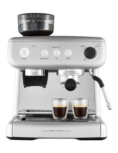 an espresso machine with two cups on the side