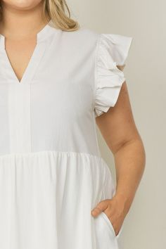 This Ruffled Pocket Tiered Midi Dress is perfect for any occasion! It's lightweight, has fun sleeves that are ruffled to perfection, and can easily be switched from casual to dressy. Forget a closet full of options-- this dress has you covered! This dress features a v-neck, placket, ruffled cap sleeves, pockets, is lined and has a tiered flowy midi silhouette. It's the perfect additional to your wardrobe. Small Bust 38" Length 44" : Medium Bust 40" Length 44" Large Bust 42" Length 44" : XL Bust Cotton Midi Dress With Ruffle Sleeves, Chic Cotton Ruffle Sleeve Dress, Spring Tiered Flutter Sleeve Dress With Ruffle Hem, Spring Tiered Dress With Ruffle Hem And Flutter Sleeves, Cotton Mini Dress With Ruffle Sleeves For Day Out, Spring Flowy Ruffle Sleeve Dress, Casual Tiered Ruffle Sleeve Dress With Ruffles, Flowy Spring Ruffle Sleeve Dress, Spring Ruffle Dress With Flutter Sleeves For Day Out