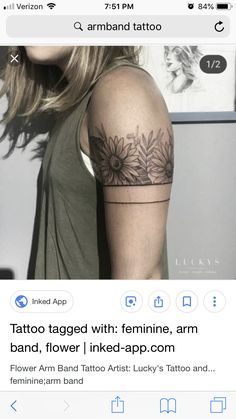 a woman with a sunflower tattoo on her arm and the words flower arm band tattoo artist lucky's tattoo and visit