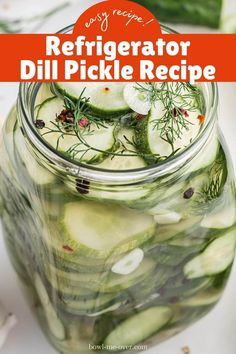 a mason jar filled with cucumbers and dill pickles for refrigerator