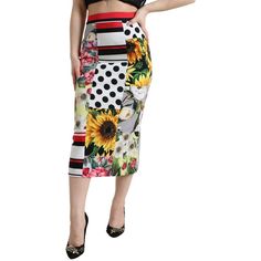 Exude Elegance With This Stunning High-Waisted Patchwork Pencil Skirt From Dolce & Gabbana. Perfectly Crafted To Accentuate Your Curves, This Midi Skirt Combines A Playful Multicolor Patchwork Design With The Luxurious Feel Of Silk Stretch Fabric. It’s A Statement Piece That Promises Both Comfort And High-End Fashion. The Zipper Closure Ensures A Seamless Fit, While The Signature Logo Details Add That Exquisite Dolce & Gabbana Touch. Ideal For Elevating Any Sophisticated Wardrobe, This Skirt Is Elegant Spring Patchwork Skirt, Elegant Fitted Patchwork Skirt, Elegant Multicolor Floral Print Bottoms, Fitted Patchwork Party Bottoms, Patchwork Party Bottoms, Multicolor Fitted Midi Skirt, Multicolor Fitted Midi Pencil Skirt, Fitted Multicolor Midi Pencil Skirt, Multicolor Midi Pencil Skirt For Summer