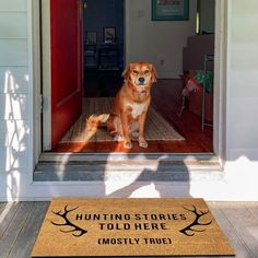 a dog is sitting in the front door with his shadow on the mat that says hunting stories told here mostly true