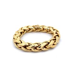 Crafted from radiant 18 karat yellow gold, this bracelet features a unique giant wheat chain design that will add sophistication to any look. The high polished yellow gold exudes a luminous shine, making this piece truly eye-catching. While there is a slight denting present, it only adds to the character and individuality of this one-of-a-kind bracelet. With a double safety clasp, you can wear this bracelet with confidence and ease. Elevate any look with this modern and stylish bracelet, perfect for any occasion. Yellow Gold Link Bracelet With Wheat Chain, Luxury Gold Plated Wheat Chain Jewelry, Luxury Wheat Chain Link Bracelet, Luxury Yellow Gold Chunky Chain Bracelet, Luxury Hallmarked Yellow Gold Chain Bracelet, Platinum Rose Gold, Sapphire Solitaire, Stylish Bracelet, Shop Engagement Rings