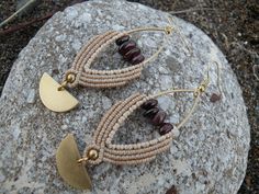 Garnet Macrame Earrings, Brass Marquise Half Moon Tribal Hippie Earrings, Beaded Bohemian Style Jewelry This statement hippie earrings are created using the macrame technique. It is made by a high quality tan waxed thread. Also, we use a Garnet chips beads and brass moon charms to complete design. Waxed thread gives the product durability and strength, and elegant natural appearance. It's a beautiful gift and a nice accessory what you can wear every day. Earrings characteristics: *Marquise brass Adjustable Teardrop Bohemian Wrap Earrings, Bohemian Teardrop Wrap Earrings, Beige Teardrop Bohemian Jewelry, Bohemian Beige Teardrop Jewelry, Beige Bohemian Teardrop Jewelry, Adjustable Bohemian Brass Wrap Earrings, Adjustable Bohemian Beaded Wrap Earrings, Bohemian Beaded Dangle Wrap Earrings, Bohemian Beige Dangle Jewelry