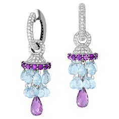 18kt solid gold Transformable Chandelier earrings with briolette natural topazes, amethysts and diamonds. 18 kt solid gold: you can choose yellow or white. All gemstones are natural. Earrings can be worn in different ways: as a Chandelier earrings and a Hoop Earrings. Transformable jewellery can be adapted for different occasions, and these masterpieces provide some stunning options. February birthstone. November birthstone. All gemstones are natural. Weight: 22 g. Earrings size: 80 x 25 mm. Gemstones: - Natural topazes: Approximately weight - 25.00 carat Briolette cut, blue color. - Natural amethyst: Approximately weight - 14.00 carat Round and briolette cut, violet color. - Diamonds: Approximately weight - 2.50 carat, F/VS Round brilliant cut. - It could be done in white, yellow solid go Transformable Jewellery, Natural Earrings, Briolette Earrings, Jacket Earrings, Necklace For Girlfriend, Turkish Jewelry, Amethyst Gold, Rose Quartz Ring, Diamond Earring