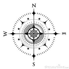 a black and white compass with stars on it