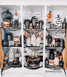 the shelves are decorated with halloween decorations