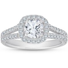 a white gold engagement ring with an oval center surrounded by round diamonds