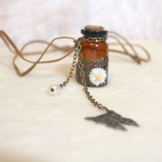 Vintage Sweet Wishing Keepsake Bottle Necklace Leather Necklace 31" Long Glass Dangling Charm Bottle Necklace Brown Suede Necklace 31" Long Totally Unique And One Of A Kind! #Glassbottle #Keepsake #Charms #Bottlenecklace #Brownsuede Brown Vintage Charm Jewelry As Gift, Vintage Brown Necklace For Gift, Vintage Brown Necklace For Gifts, Cute Handmade Brown Jewelry, Spooky Soiree, Suede Necklace, Necklace Leather, Bottle Wrapping, Bottle Necklace