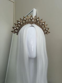 This pearl halo crown will be perfect for any upcoming bridal or baby shower, party, festival/concert or photoshoot. All crowns are hand made to order using quality materials: cable/zip ties for their durability and flexibility, lightweight metal filigree, glass and resin cabochons, and rhinestones. Please allow 1 week for production. If you require the item in a designated time frame, please send a message before purchasing and I will try my best to accommodate your order. Halo Crown Wedding, Gold Halo Crown, Pearl Halo, Festival Headpiece, Goddess Crown, Halo Crown, Fascinator Hairstyles, Festival Concert, Crown Wedding