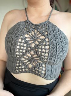 Embrace your free spirit with our Crochet Festival Boho Halter Top! Handmade for sizes XS-XL, it's perfect for summer concerts or midsummer festivities. Each stitch tells a story of craftsmanship and bohemian charm, creating a unique, hippie-chic look that celebrates your individuality. Dive into the bloom of summer with a top that’s as authentic as you are. 🌸✨Meet the Midsummer Bloom top, made with 100% cotton, this dainty little piece makes any look complete.

Features a peek-a-boo flower sti Boho Halter Top, Summer Concerts, Crochet Festival, Womens Halter Tops, Crochet Summer, Summer Concert, Halter Tops, Top For Women, Summer Crochet